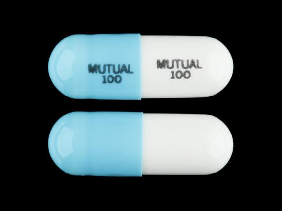 Pill MUTUAL 100 MUTUAL 100 White Capsule/Oblong is Doxycycline Hyclate