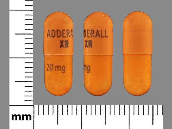 Pill SHIRE 381 20mg Orange Capsule/Oblong is Adderall XR