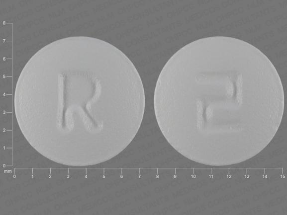 Pill R 2 White Round is Quetiapine Fumarate
