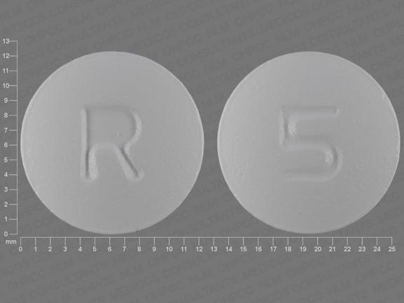Pill R 5 White Round is Quetiapine Fumarate