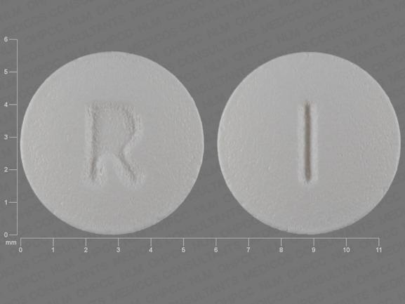 Pill R 1 White Round is Quetiapine Fumarate