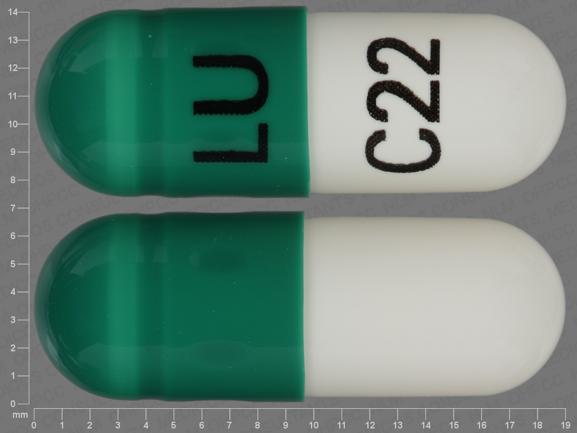 Pill LU C22 Green & White Capsule/Oblong is Fenofibrate (Micronized)