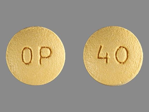 Pill OP 40 Yellow Round is OxyContin