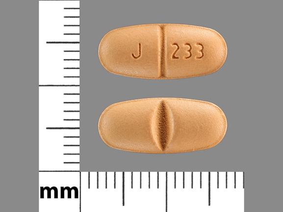 Pill J 233 Orange Elliptical/Oval is Oxcarbazepine