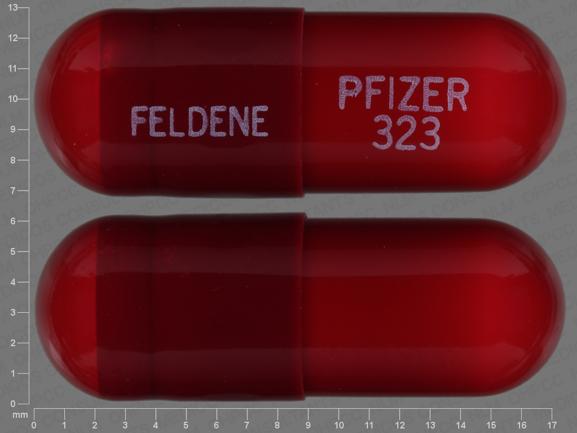 Pill FELDENE PFIZER 323 Red Capsule-shape is Piroxicam