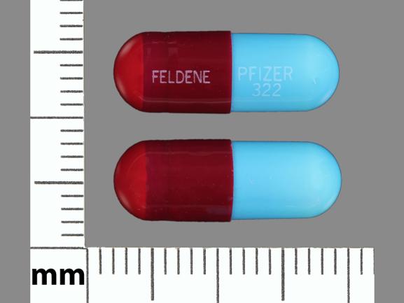 Pill FELDENE PFIZER 322 Maroon Capsule-shape is Piroxicam