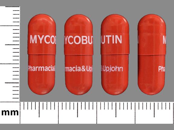 Pill MYCOBUTIN Pharmacia & Upjohn Brown Capsule/Oblong is Rifabutin