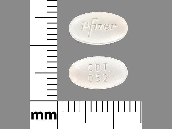 Pill Pfizer CDT 052 White Oval is Amlodipine Besylate and Atorvastatin Calcium