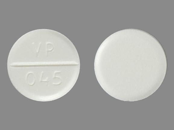 Pill VP 045 White Round is Aminocaproic Acid