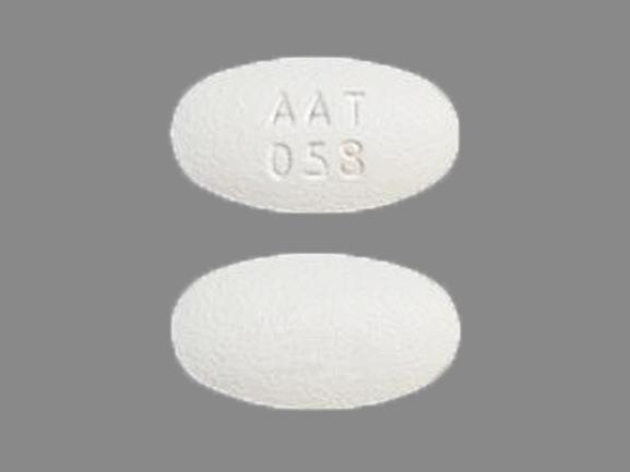 Pill AAT 058 White Oval is Amlodipine Besylate and Atorvastatin Calcium