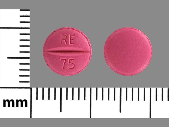 Pill RE 75 Pink Round is Metoprolol Tartrate.