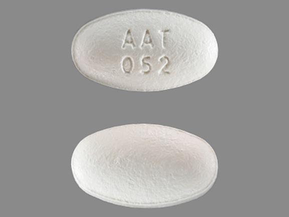Pill AAT 052 White Oval is Amlodipine Besylate and Atorvastatin Calcium