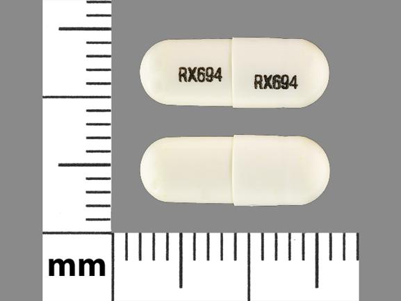 Pill RX694 RX694 White Capsule/Oblong is Minocycline Hydrochloride