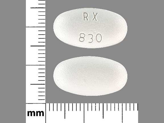 Pill RX 830 White Oval is Atorvastatin Calcium