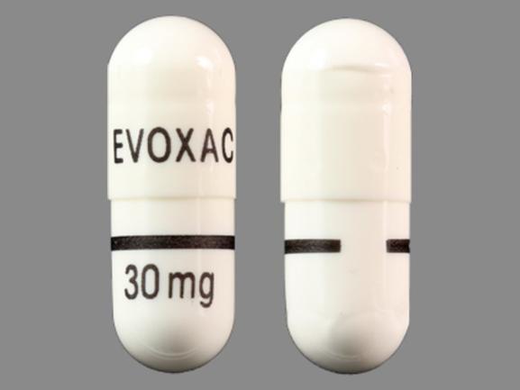 Pill EVOXAC 30 mg White Capsule-shape is Evoxac