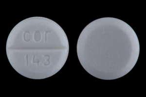Pill cor 143 White Round is Benztropine Mesylate