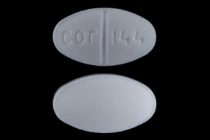 Pill cor 144 White Oval is Benztropine Mesylate