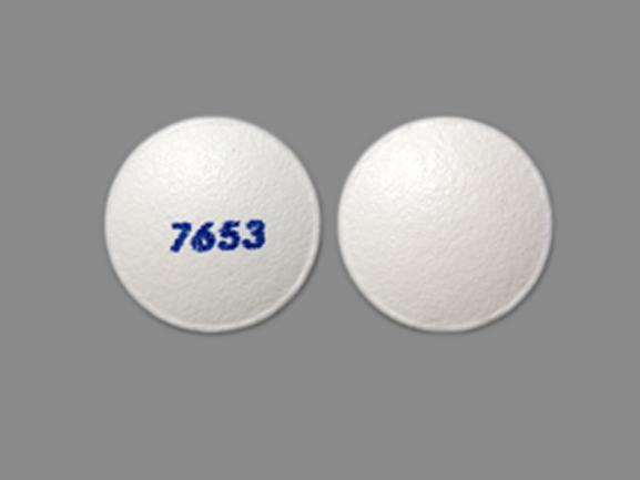 Pill 7653 White Round is Olanzapine