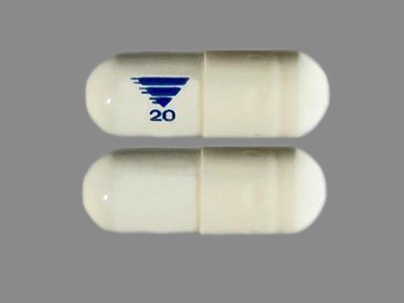 Pill 20 White Capsule/Oblong is Omeprazole and Sodium Bicarbonate