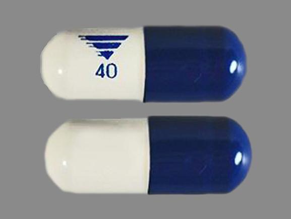 Pill 40 Blue & White Capsule/Oblong is Omeprazole and Sodium Bicarbonate