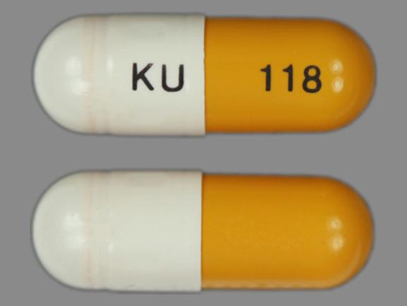 Pill KU 118 Gold & White Capsule/Oblong is Omeprazole Delayed Release