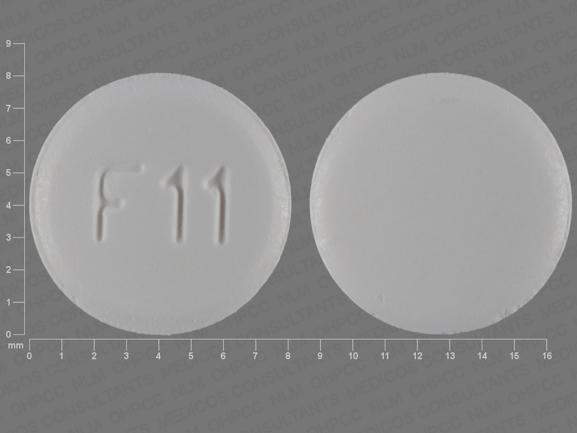 Pill F11 White Round is Zolmitriptan (Orally Disintegrating)