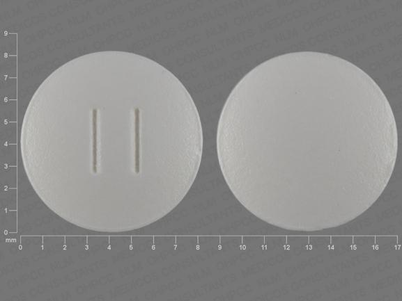 Pill 11 White Round is Losartan Potassium