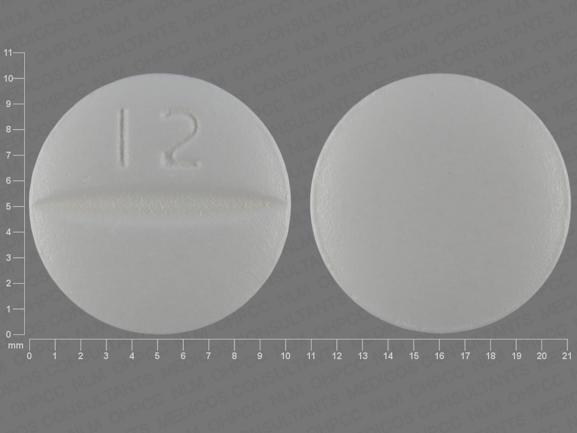 Pill 12 White Round is Losartan Potassium