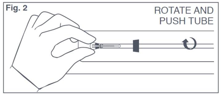 Figure 2: Inserting Tips of T-Arms of Paraguard into Insertion Tube